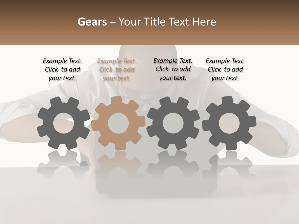 A Man Sitting In Front Of A Laptop Computer PowerPoint Template