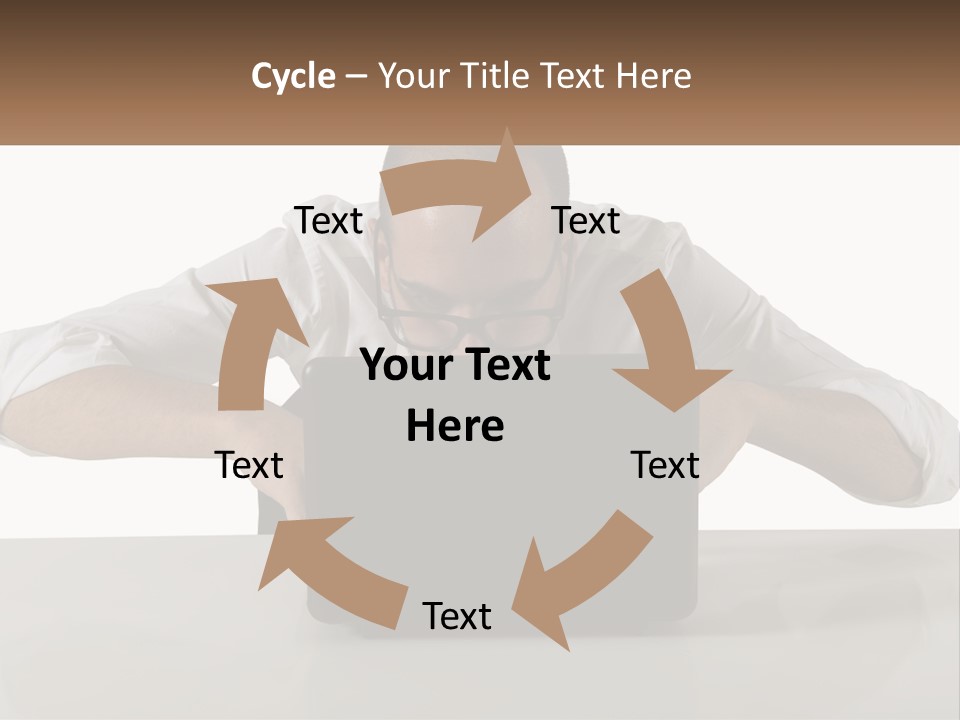 A Man Sitting In Front Of A Laptop Computer PowerPoint Template
