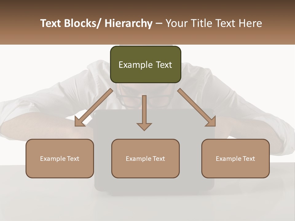 A Man Sitting In Front Of A Laptop Computer PowerPoint Template