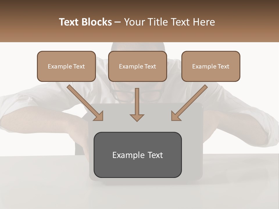 A Man Sitting In Front Of A Laptop Computer PowerPoint Template
