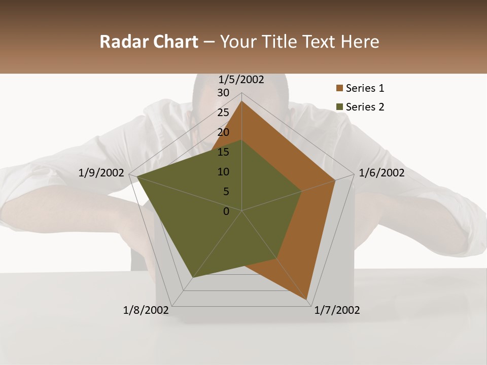 A Man Sitting In Front Of A Laptop Computer PowerPoint Template