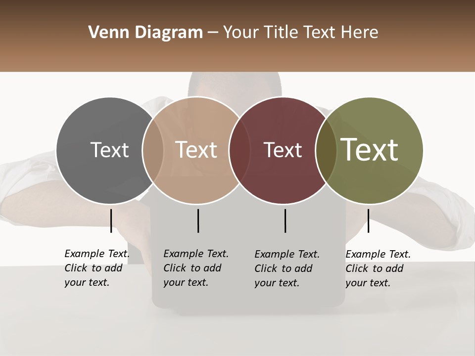 A Man Sitting In Front Of A Laptop Computer PowerPoint Template