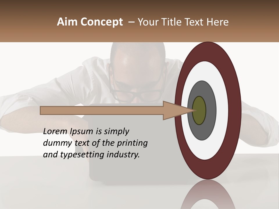 A Man Sitting In Front Of A Laptop Computer PowerPoint Template