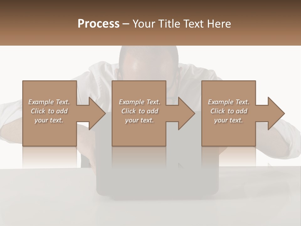 A Man Sitting In Front Of A Laptop Computer PowerPoint Template