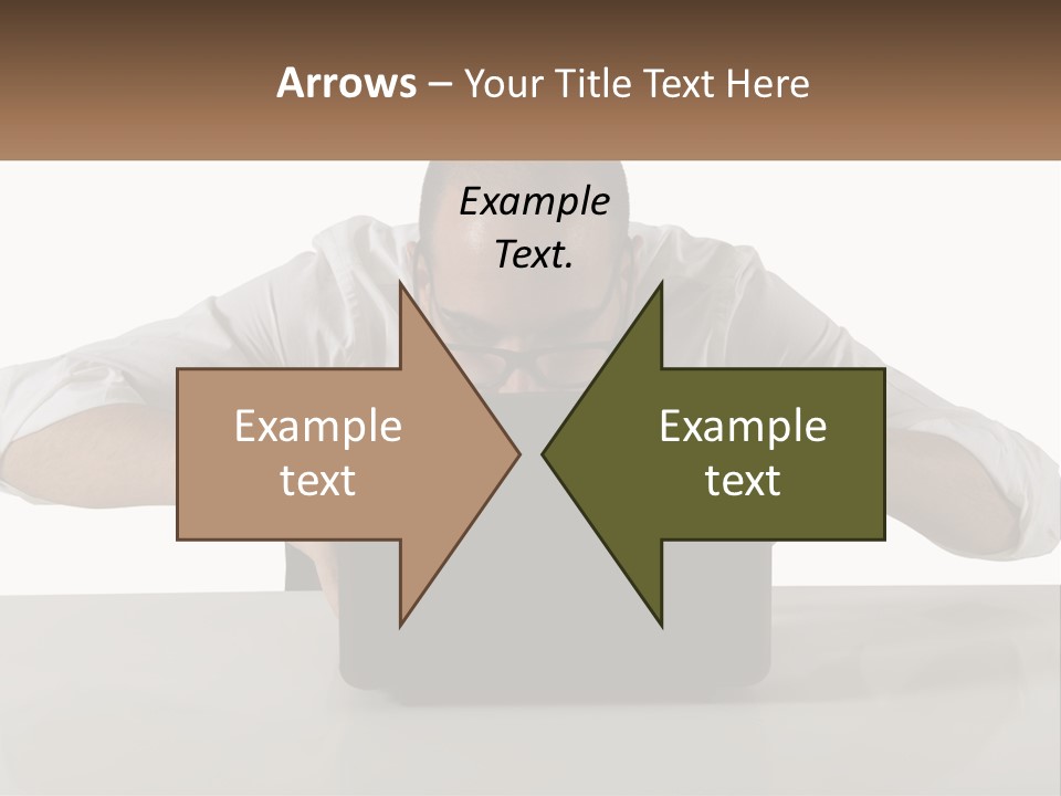 A Man Sitting In Front Of A Laptop Computer PowerPoint Template