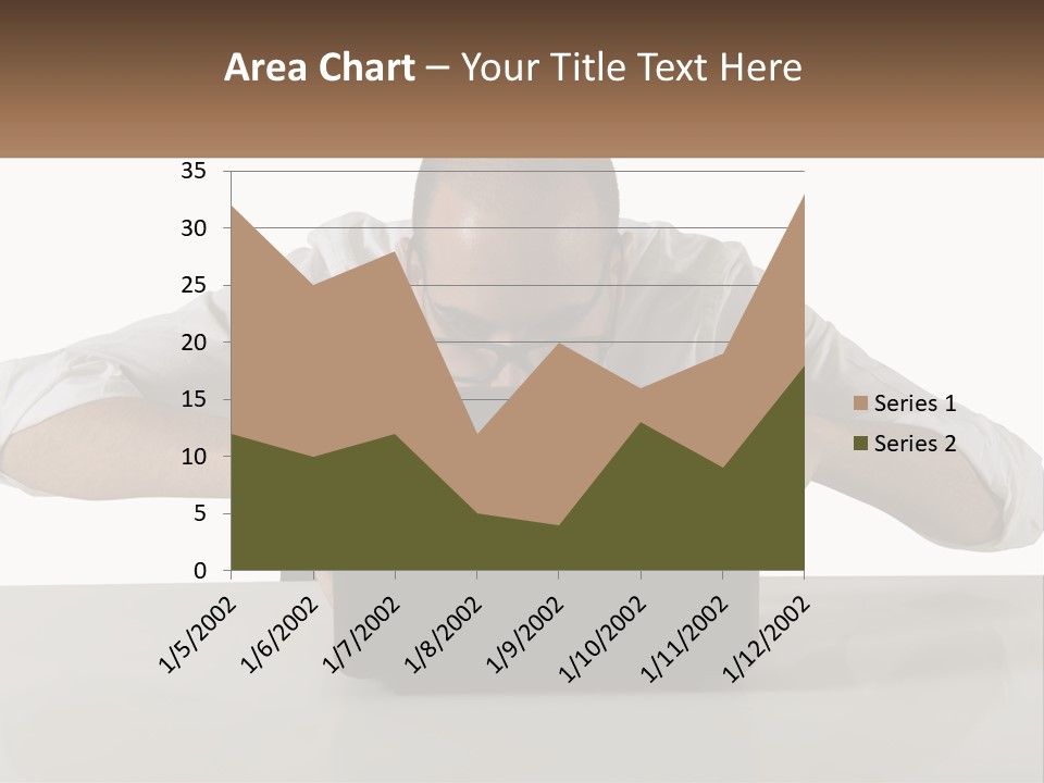 A Man Sitting In Front Of A Laptop Computer PowerPoint Template