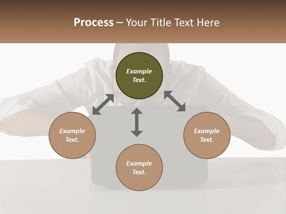 A Man Sitting In Front Of A Laptop Computer PowerPoint Template