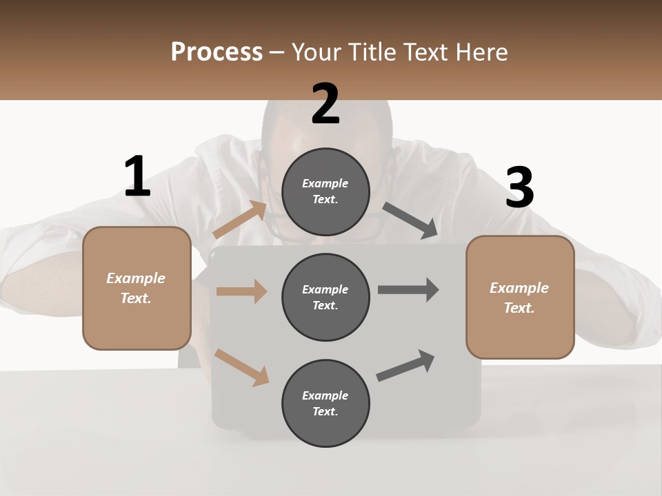 A Man Sitting In Front Of A Laptop Computer PowerPoint Template