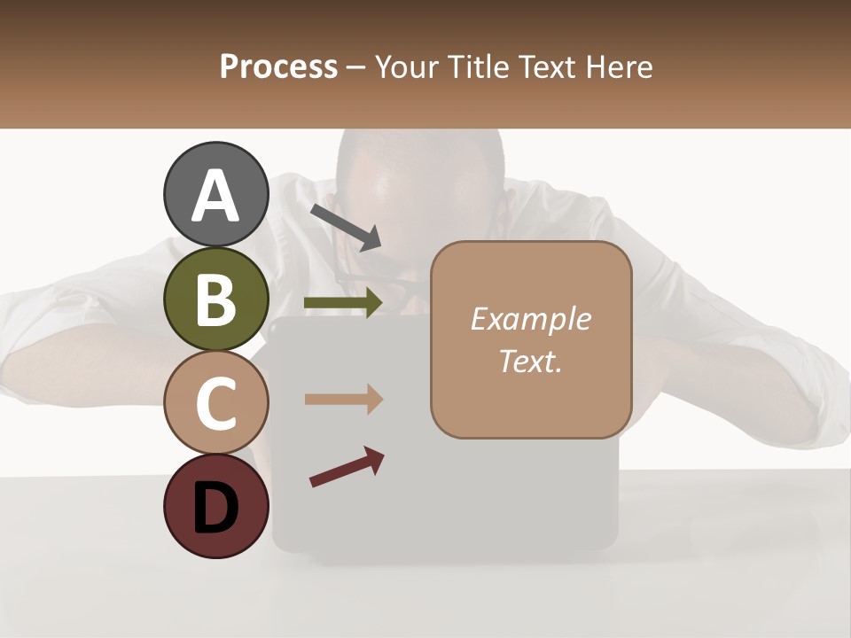 A Man Sitting In Front Of A Laptop Computer PowerPoint Template