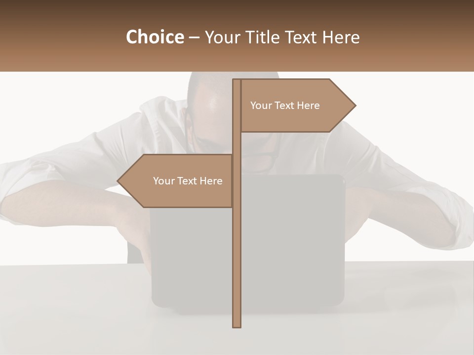 A Man Sitting In Front Of A Laptop Computer PowerPoint Template