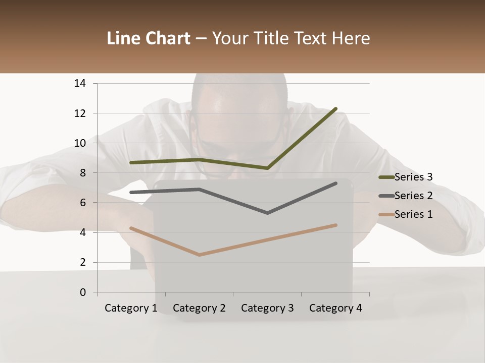 A Man Sitting In Front Of A Laptop Computer PowerPoint Template