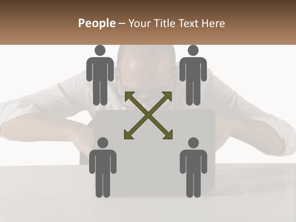 A Man Sitting In Front Of A Laptop Computer PowerPoint Template