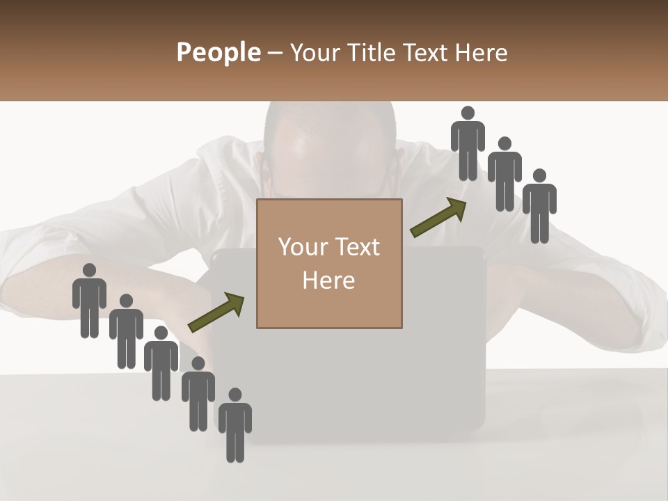 A Man Sitting In Front Of A Laptop Computer PowerPoint Template