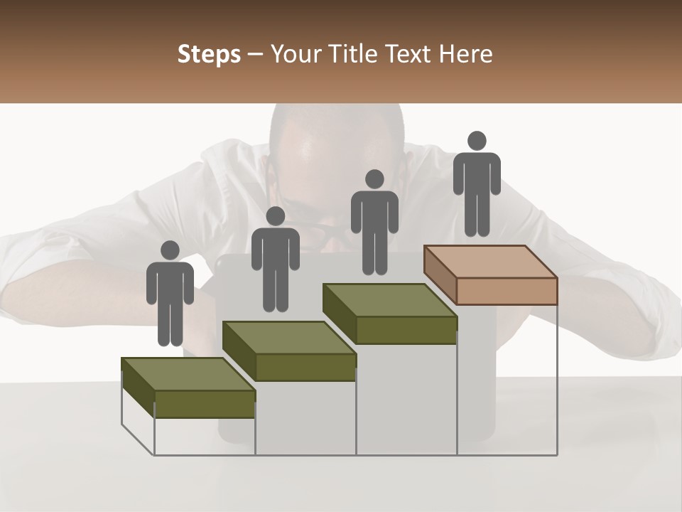 A Man Sitting In Front Of A Laptop Computer PowerPoint Template