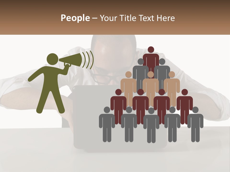 A Man Sitting In Front Of A Laptop Computer PowerPoint Template