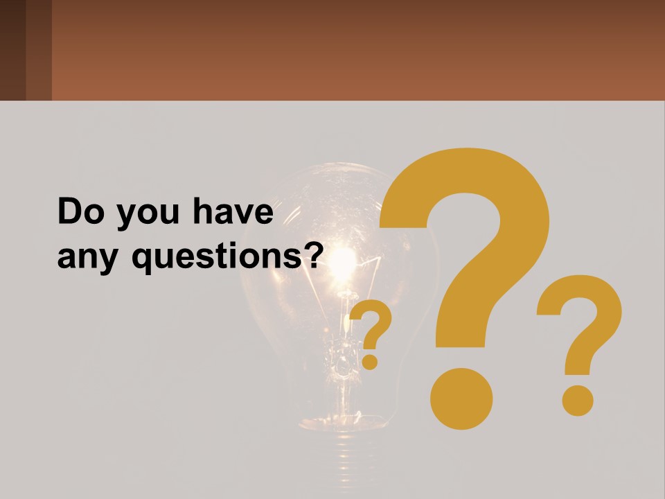 A Light Bulb On Top Of A Wooden Table PowerPoint Template