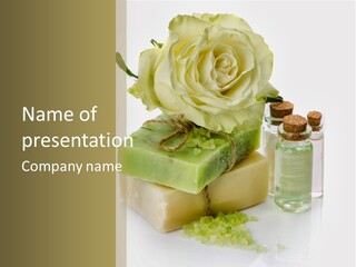 A Soap Bar With A Rose On Top Of It PowerPoint Template