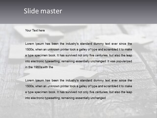 A Group Of Pieces Of A Puzzle On A Wooden Table PowerPoint Template