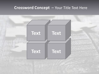 A Group Of Pieces Of A Puzzle On A Wooden Table PowerPoint Template