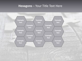 A Group Of Pieces Of A Puzzle On A Wooden Table PowerPoint Template