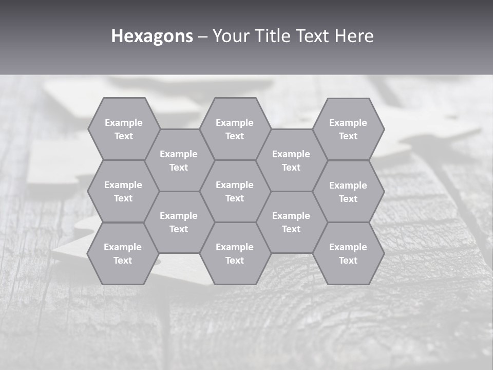 A Group Of Pieces Of A Puzzle On A Wooden Table PowerPoint Template