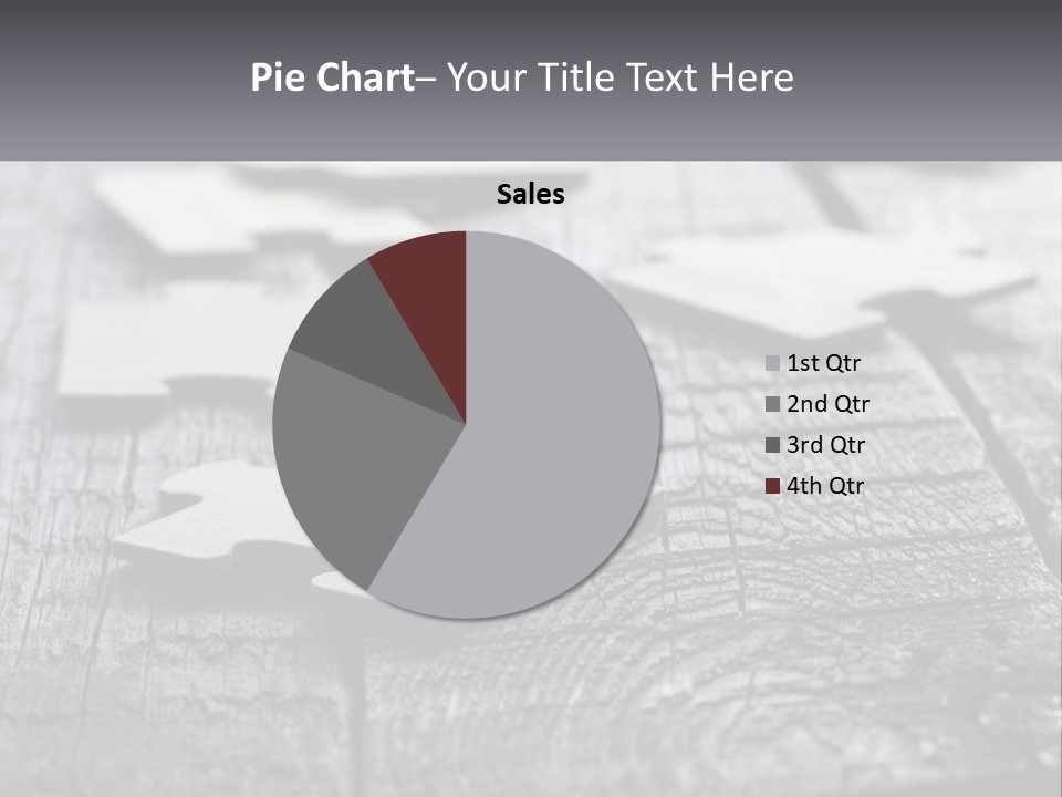 A Group Of Pieces Of A Puzzle On A Wooden Table PowerPoint Template