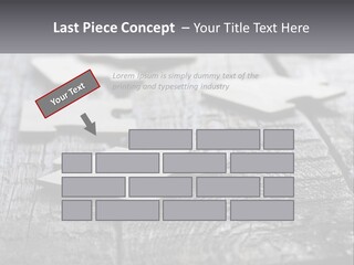 A Group Of Pieces Of A Puzzle On A Wooden Table PowerPoint Template
