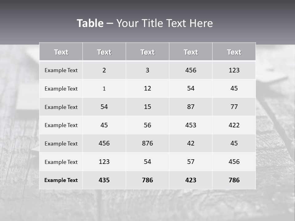 A Group Of Pieces Of A Puzzle On A Wooden Table PowerPoint Template