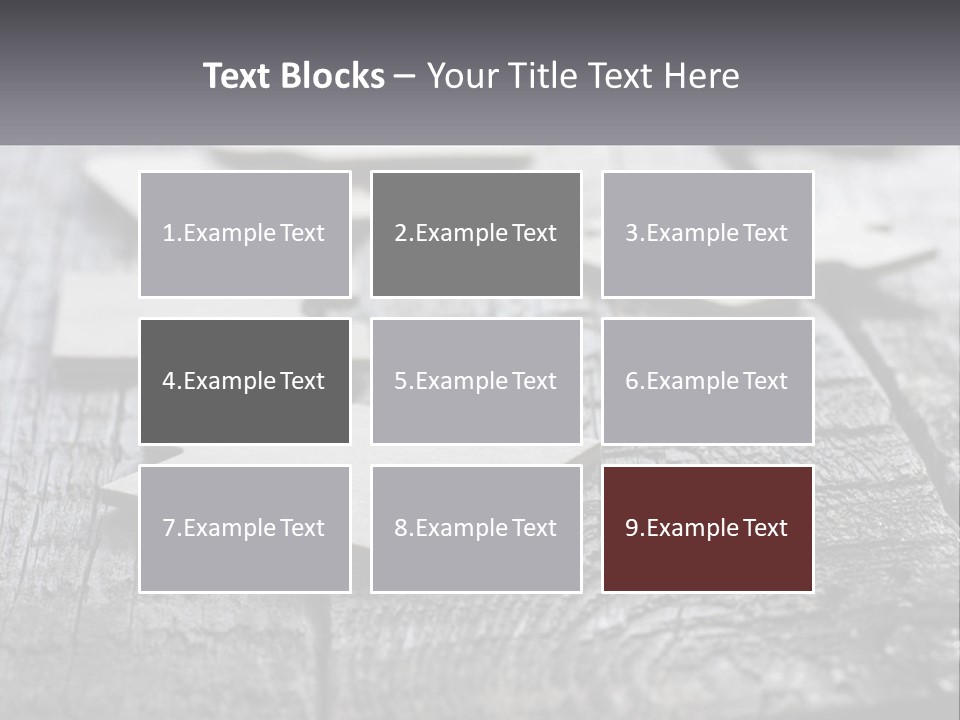 A Group Of Pieces Of A Puzzle On A Wooden Table PowerPoint Template