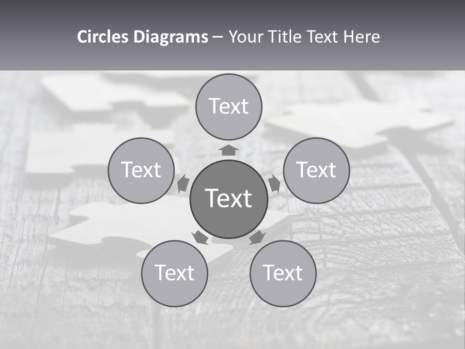 A Group Of Pieces Of A Puzzle On A Wooden Table PowerPoint Template
