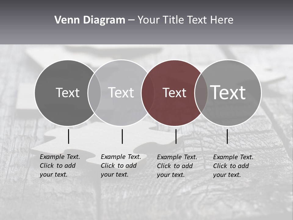 A Group Of Pieces Of A Puzzle On A Wooden Table PowerPoint Template