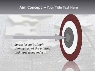 A Group Of Pieces Of A Puzzle On A Wooden Table PowerPoint Template