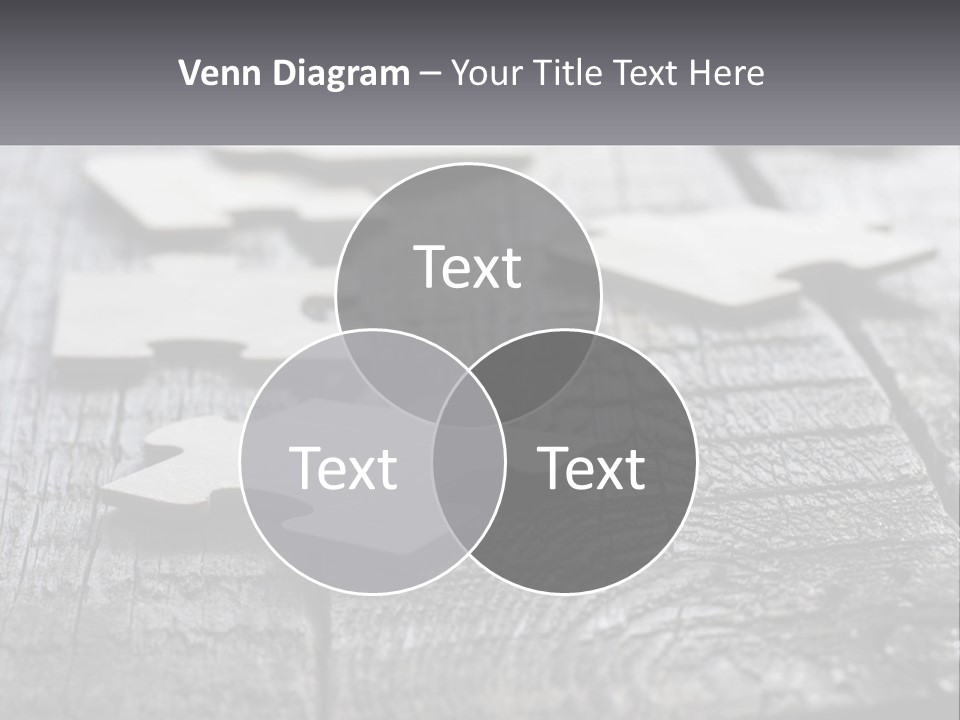 A Group Of Pieces Of A Puzzle On A Wooden Table PowerPoint Template