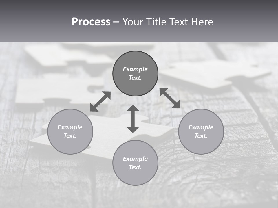 A Group Of Pieces Of A Puzzle On A Wooden Table PowerPoint Template