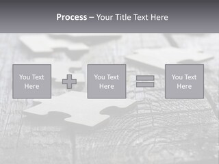 A Group Of Pieces Of A Puzzle On A Wooden Table PowerPoint Template