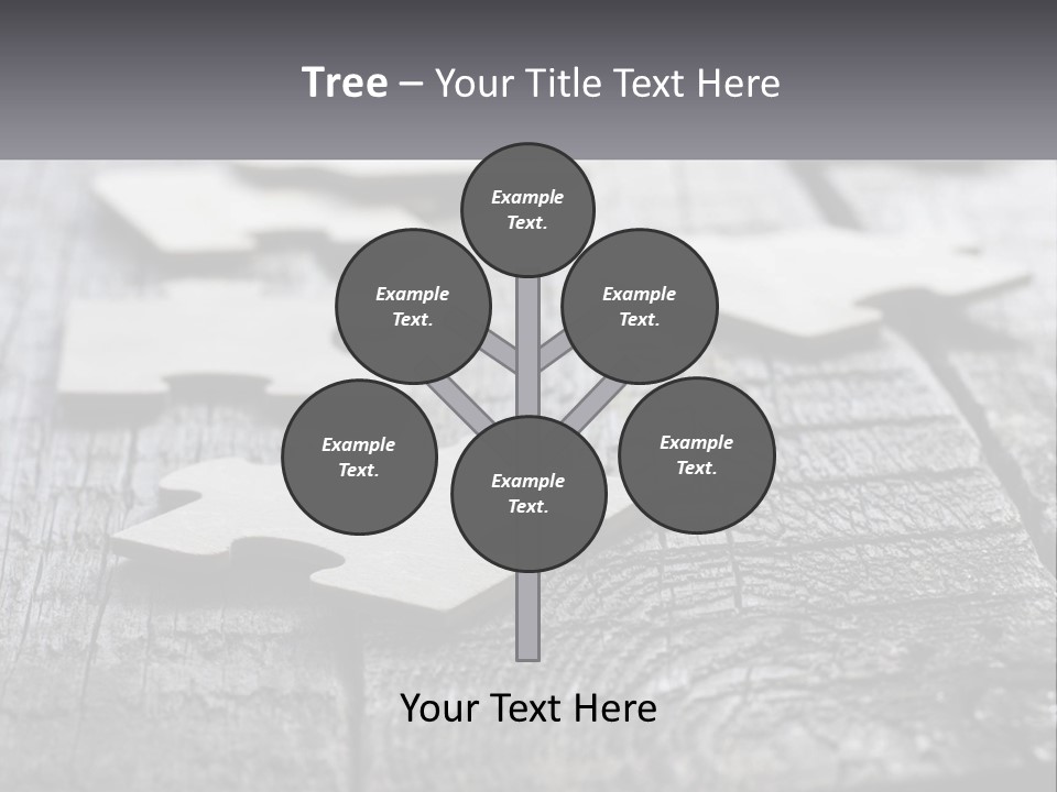 A Group Of Pieces Of A Puzzle On A Wooden Table PowerPoint Template