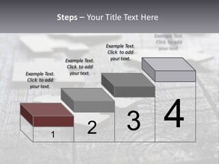 A Group Of Pieces Of A Puzzle On A Wooden Table PowerPoint Template
