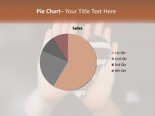 A Person Holding A Heart Shaped Object In Their Hands PowerPoint Template