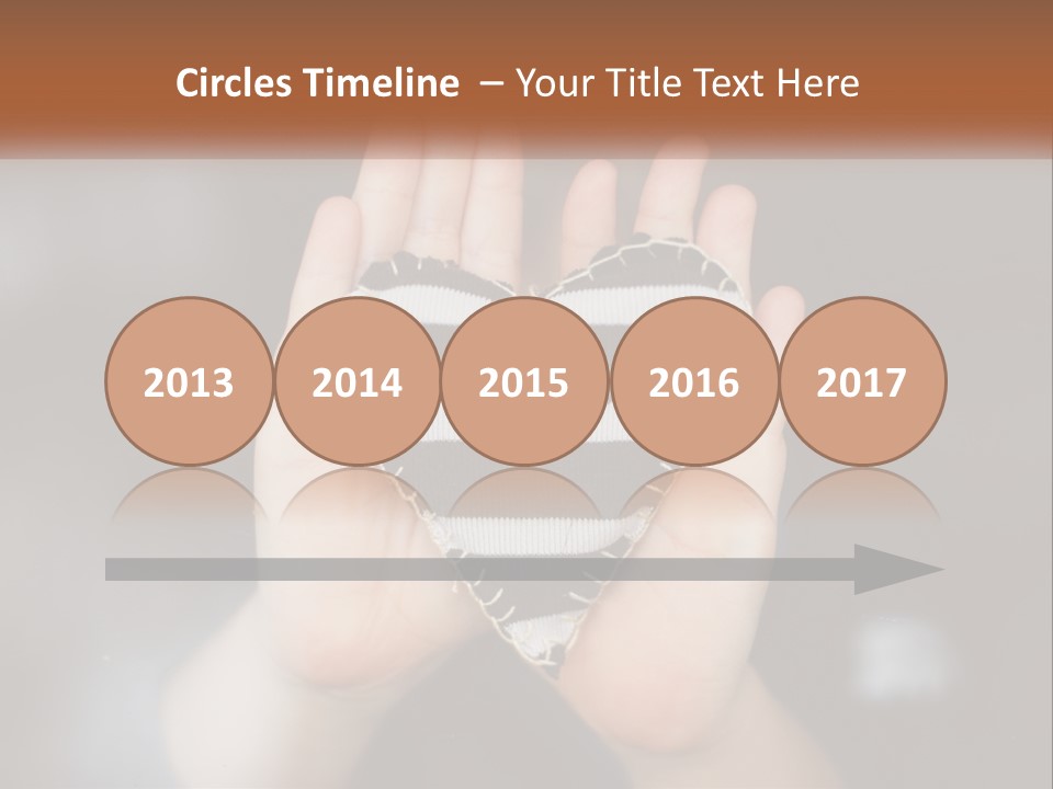 A Person Holding A Heart Shaped Object In Their Hands PowerPoint Template