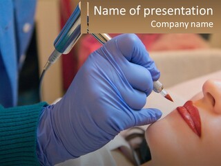 A Woman Getting Her Teeth Examined By A Dentist PowerPoint Template