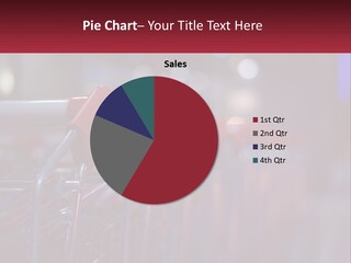 A Row Of Shopping Carts With Red Handles PowerPoint Template