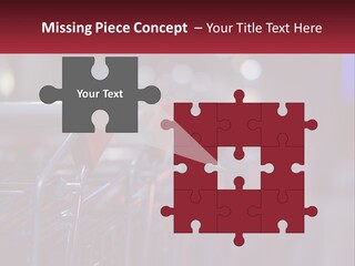 A Row Of Shopping Carts With Red Handles PowerPoint Template