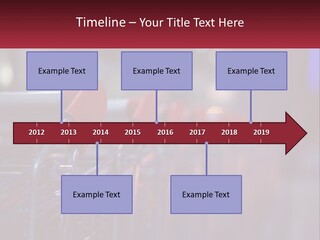 A Row Of Shopping Carts With Red Handles PowerPoint Template
