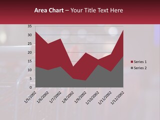 A Row Of Shopping Carts With Red Handles PowerPoint Template