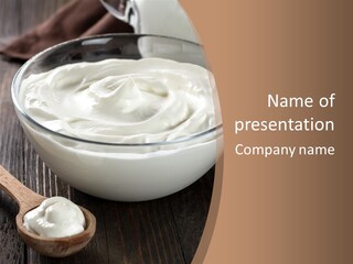 A Bowl Of Yogurt And A Spoon On A Table PowerPoint Template