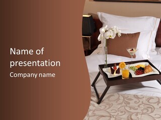 A Bed With A Tray Of Food On Top Of It PowerPoint Template