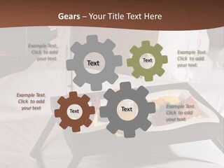 A Bed With A Tray Of Food On Top Of It PowerPoint Template