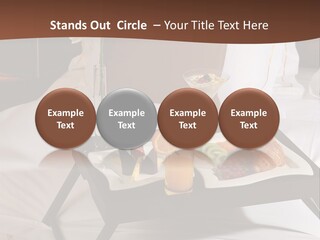 A Bed With A Tray Of Food On Top Of It PowerPoint Template