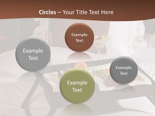 A Bed With A Tray Of Food On Top Of It PowerPoint Template