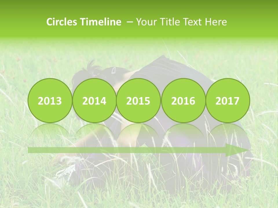 A Woman Sitting In The Grass With Her Head In Her Hands PowerPoint Template